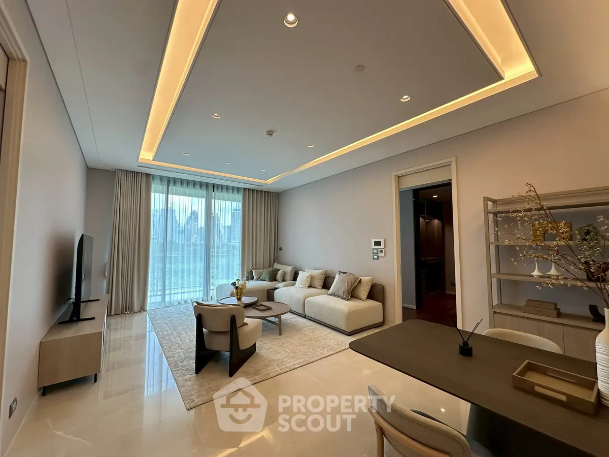 Luxurious modern living room with elegant lighting and city view, perfect for sophisticated urban living.
