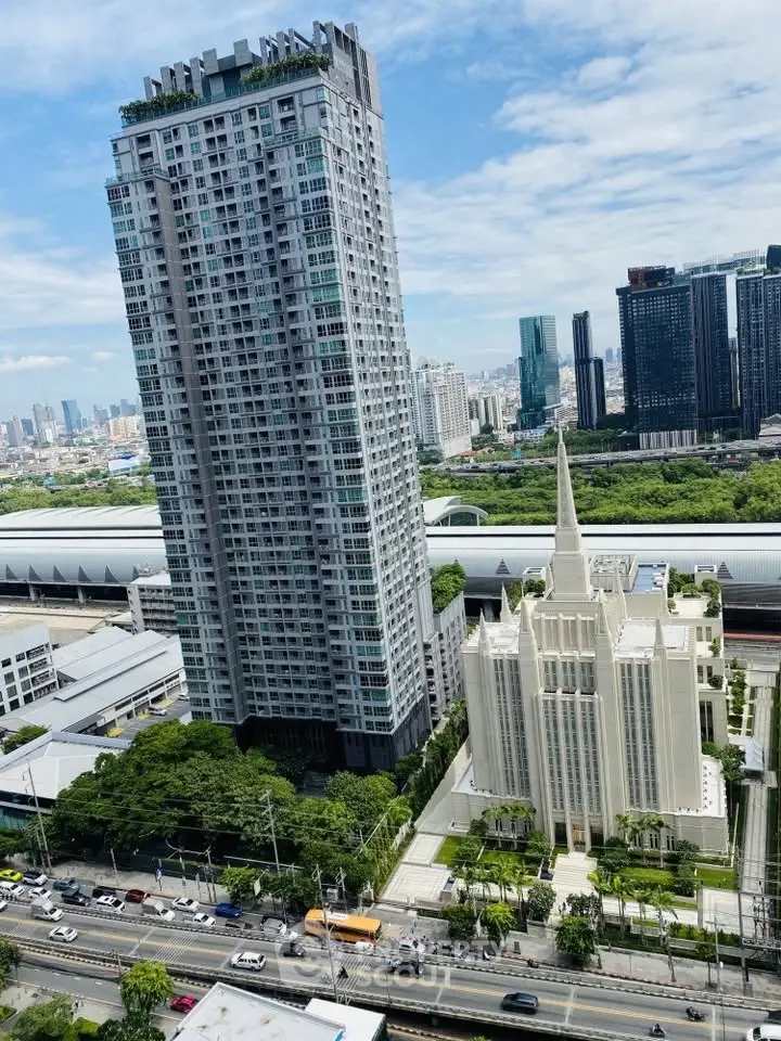 Stunning cityscape view featuring modern high-rise buildings and lush greenery, perfect for urban living.