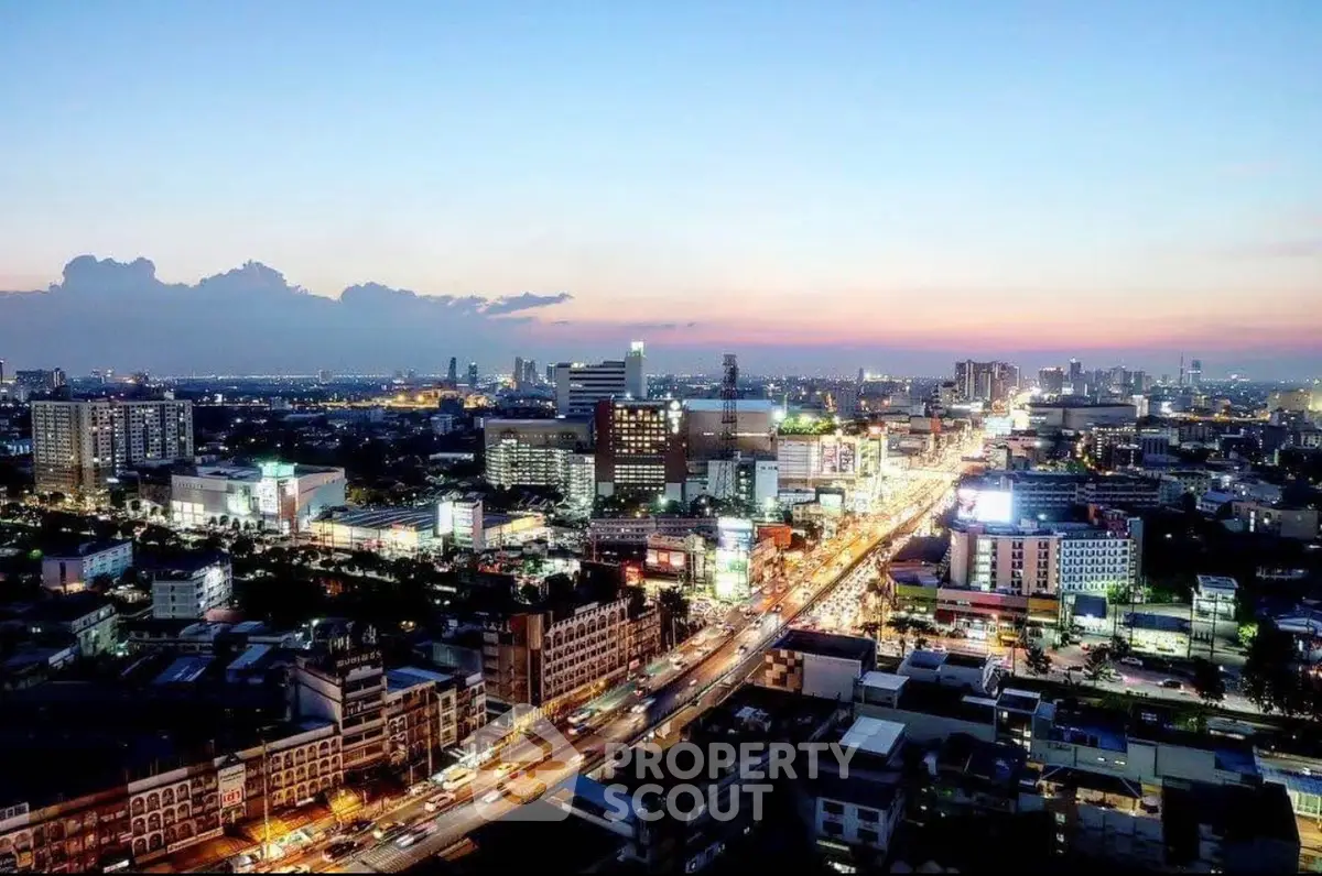 Stunning cityscape view at dusk showcasing vibrant urban skyline and bustling streets.
