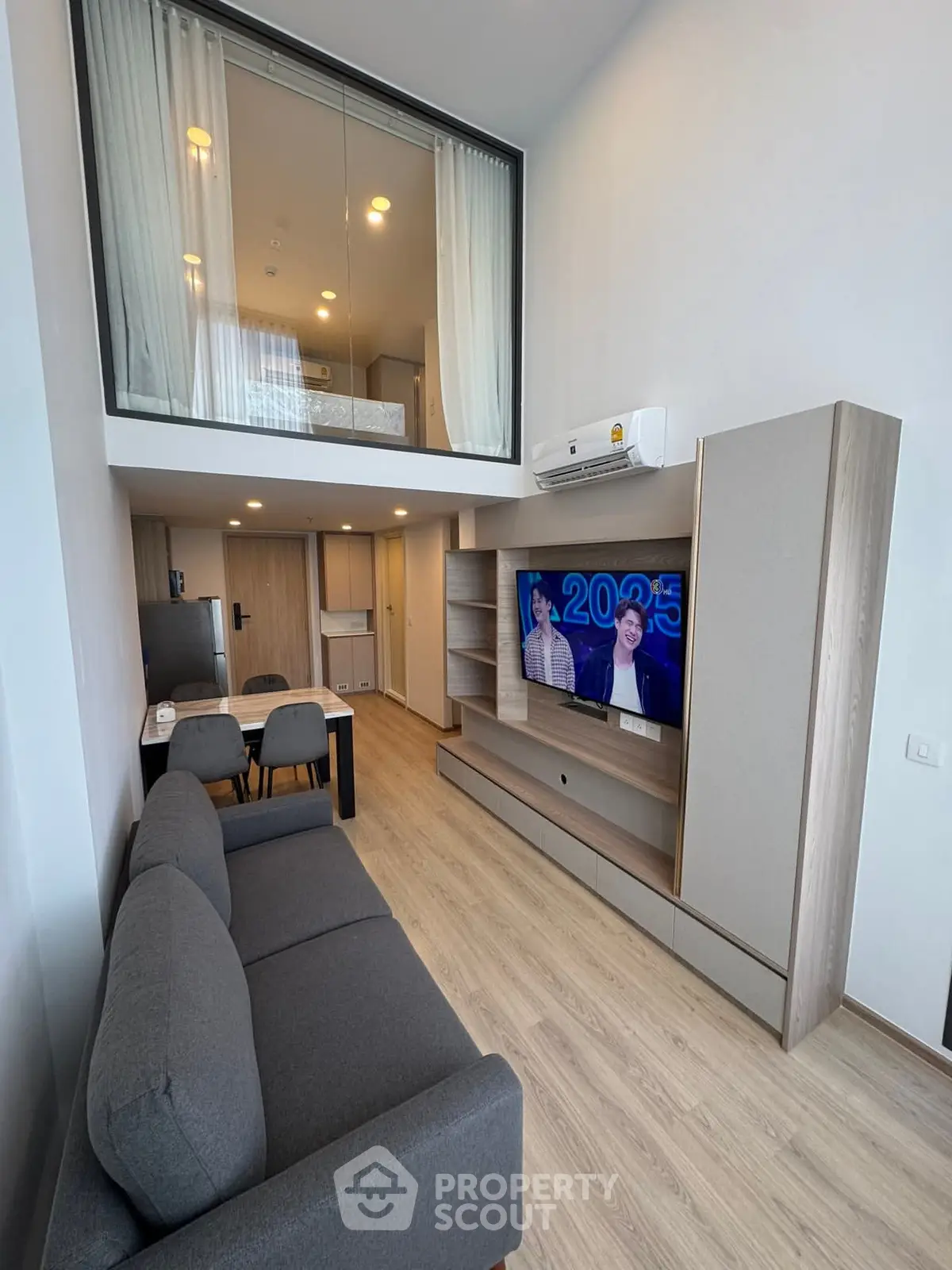 Modern loft apartment with stylish living room and mezzanine bedroom