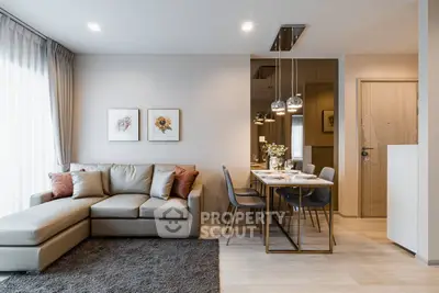 Modern living room with elegant dining area and stylish decor