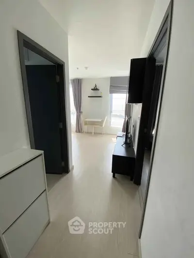Bright and modern apartment hallway with stylish decor and natural light