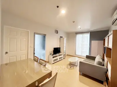 Spacious living room with modern furniture and natural light