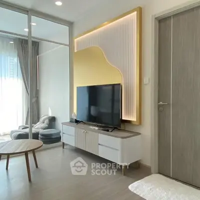Modern living room with stylish TV unit and elegant decor