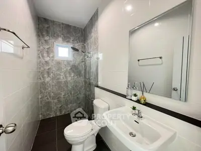 Modern bathroom with sleek design and stylish fixtures