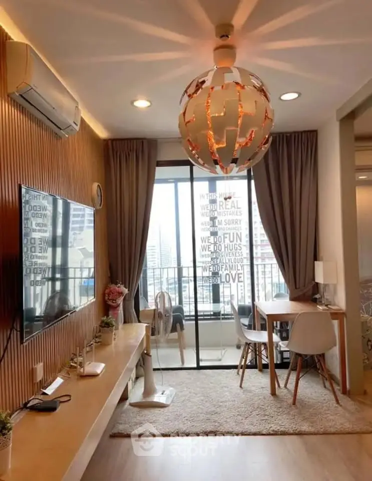 Modern living room with stylish decor and city view balcony