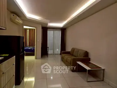 Modern living room with sleek design and cozy sofa in stylish apartment.