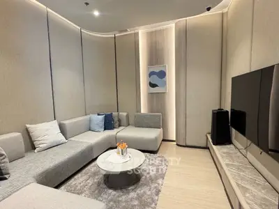 Modern living room with sleek furniture and stylish decor, perfect for relaxation and entertainment.