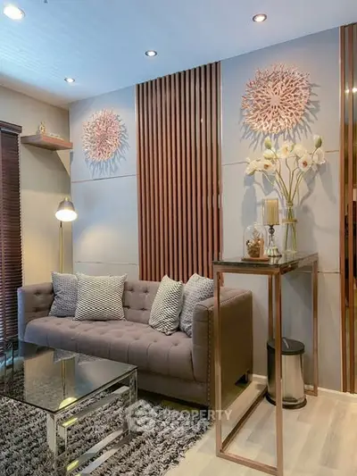 Stylish modern living room with elegant decor and cozy seating area.
