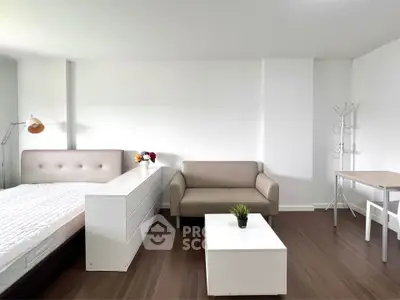 Modern studio apartment with stylish furniture and natural light