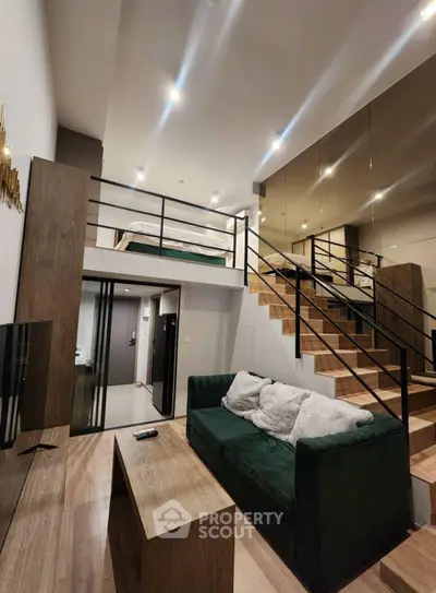 Modern loft apartment with stylish mezzanine and cozy living area