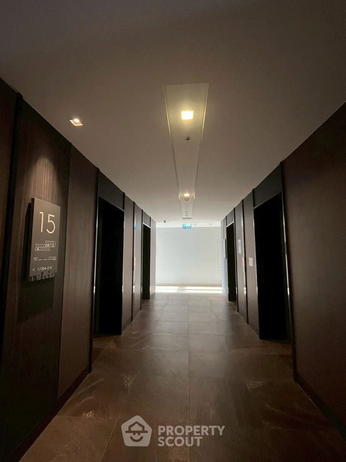Modern building elevator lobby with sleek design and ambient lighting