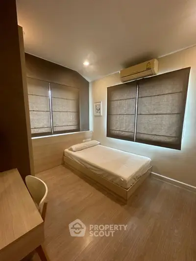 Cozy bedroom with modern design and natural light