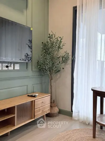 Stylish living room with modern TV setup and elegant decor