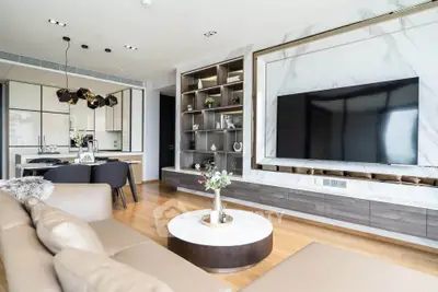 Luxurious modern living room with elegant decor and large TV