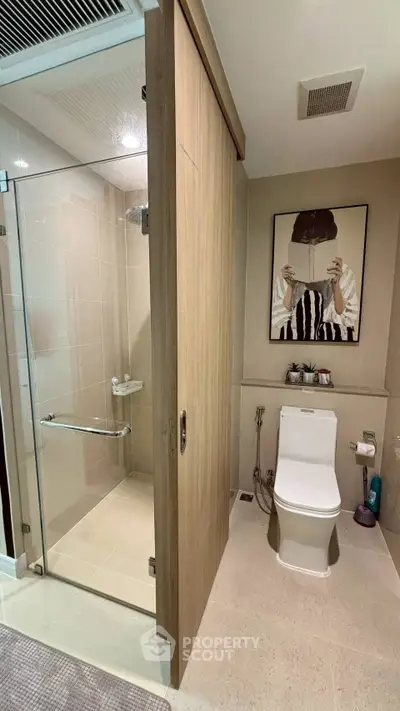 Modern bathroom with glass shower and stylish decor