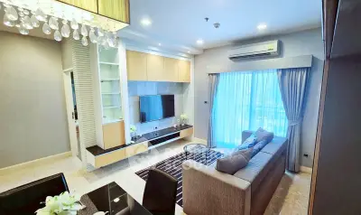 Modern living room with elegant decor and large window view