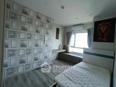 Modern bedroom with unique wall design and large window for natural light.