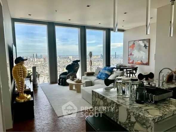 Luxurious living room with stunning city view, modern decor, and marble kitchen island.
