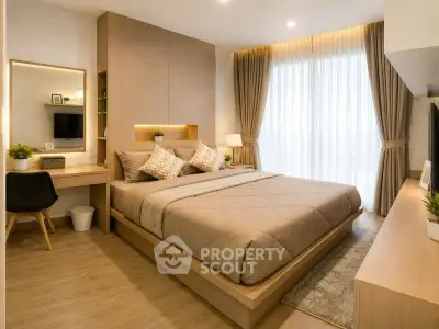 Modern bedroom with cozy decor and natural light, featuring a stylish bed and elegant furnishings.