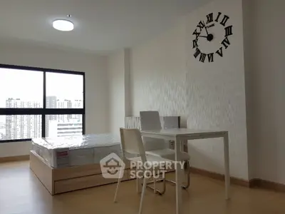 Modern minimalist bedroom with city view and stylish wall clock
