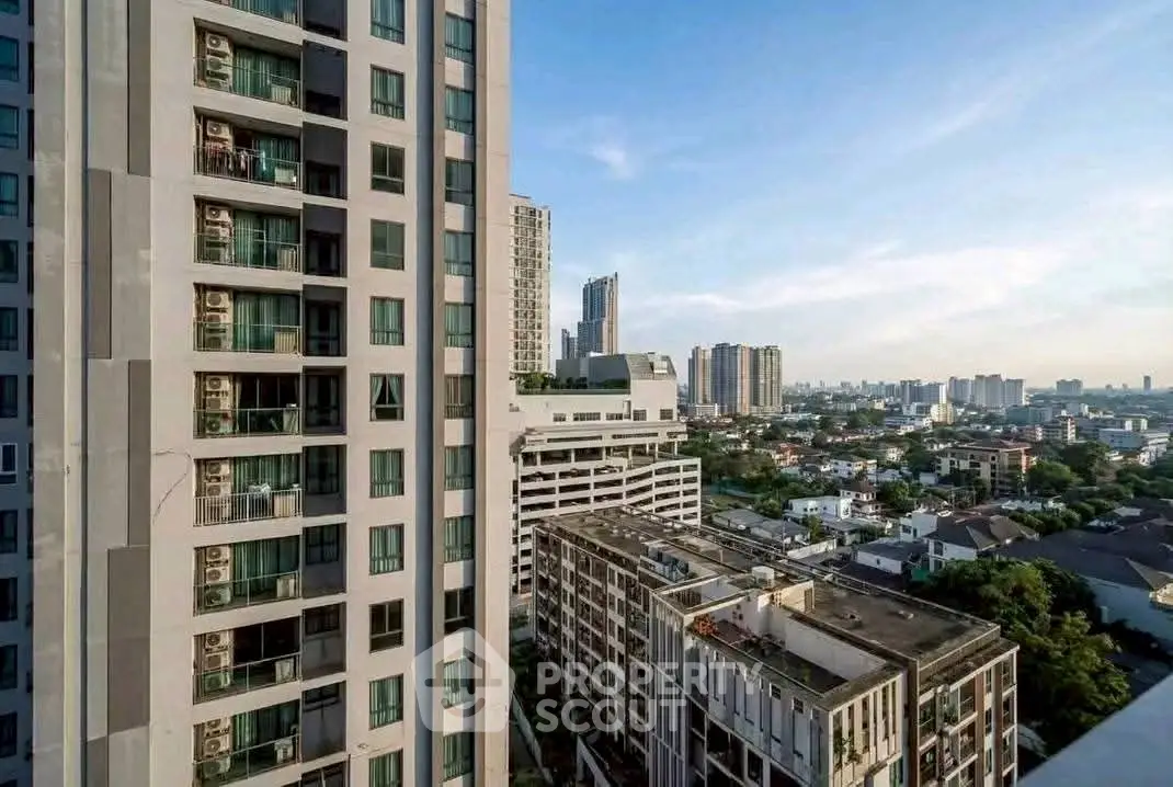 Stunning cityscape view from high-rise building showcasing urban skyline and modern architecture.