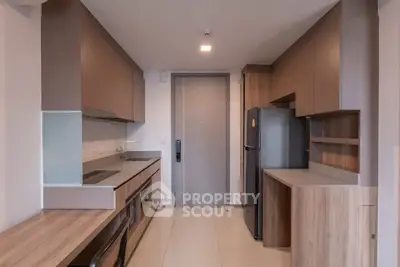 Modern kitchen with sleek cabinetry and built-in appliances