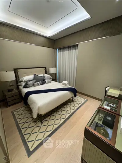 Luxurious bedroom with elegant decor and cozy ambiance, featuring a plush bed and stylish furnishings.