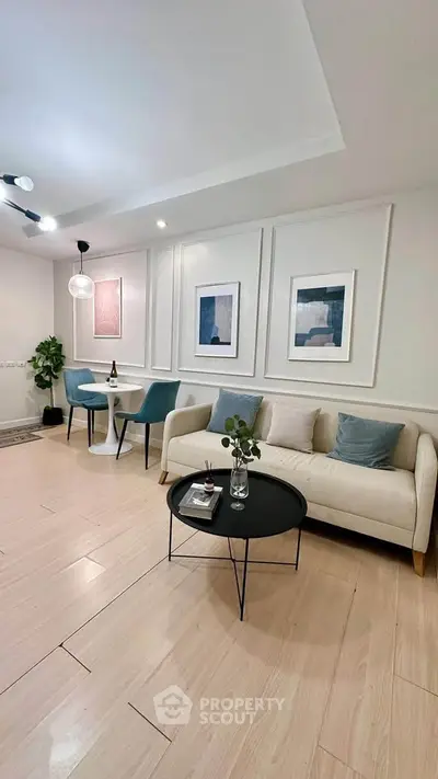 Stylish modern living room with elegant decor and cozy seating area, perfect for relaxation and entertaining.