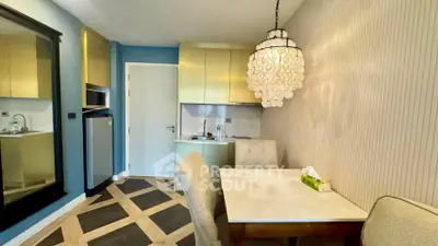 Chic kitchen and dining area with modern lighting and stylish decor