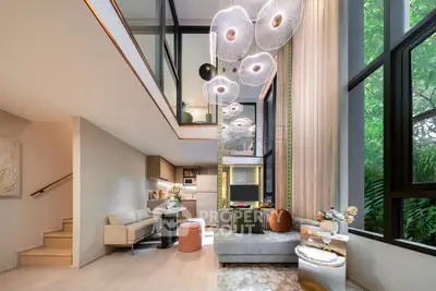 Luxurious modern living room with high ceilings and elegant lighting in a stylish apartment.