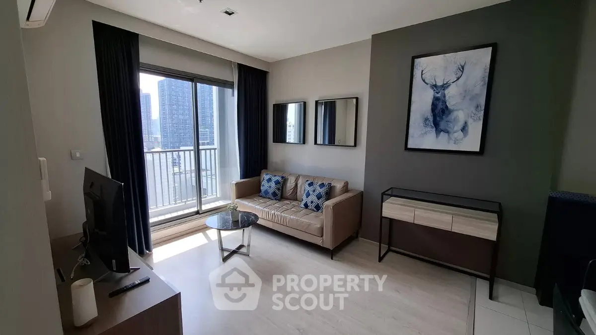 Modern living room with balcony view in high-rise apartment