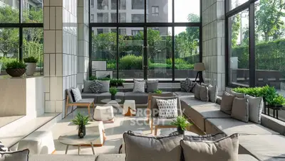 Luxurious modern living room with large windows and stylish decor in a high-end apartment complex.