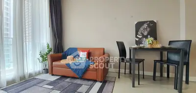 Modern living room with cozy sofa and dining area in stylish apartment