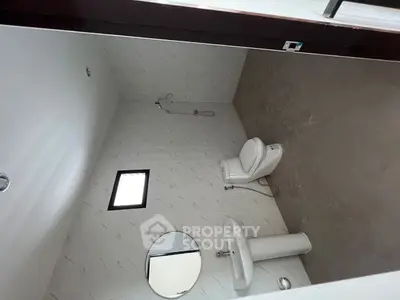 Spacious bathroom with modern fixtures and minimalist design