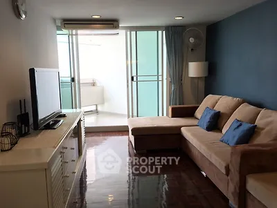 Stylish living room with modern decor and balcony access