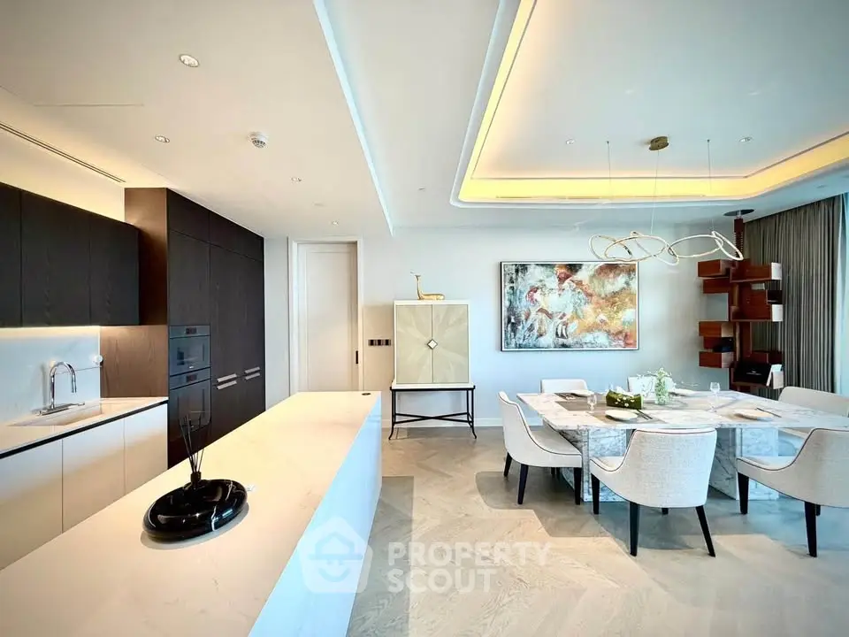 Luxurious modern kitchen and dining area with elegant decor and open layout