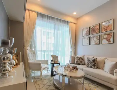 Elegant living room with stylish decor and natural light