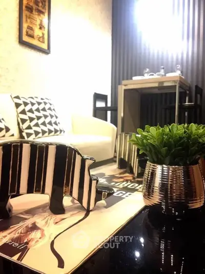 Stylish modern living room with chic decor and cozy seating area.