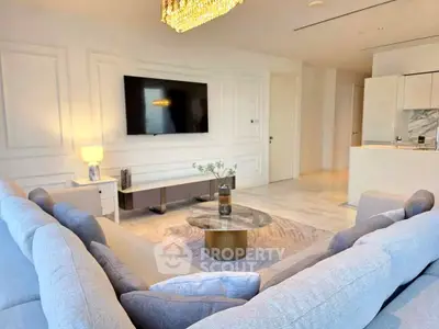 Luxurious living room with elegant decor and modern amenities in a high-end apartment.