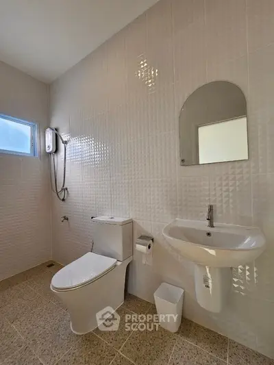 Modern bathroom with sleek fixtures and natural light