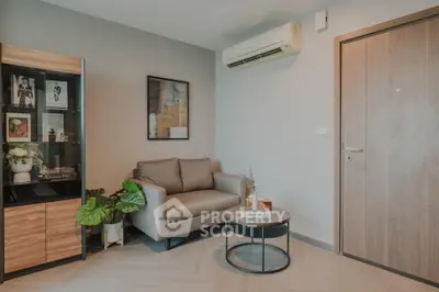 Modern living room with stylish decor and air conditioning