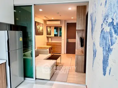 Modern living room with open layout and stylish decor in a contemporary apartment.