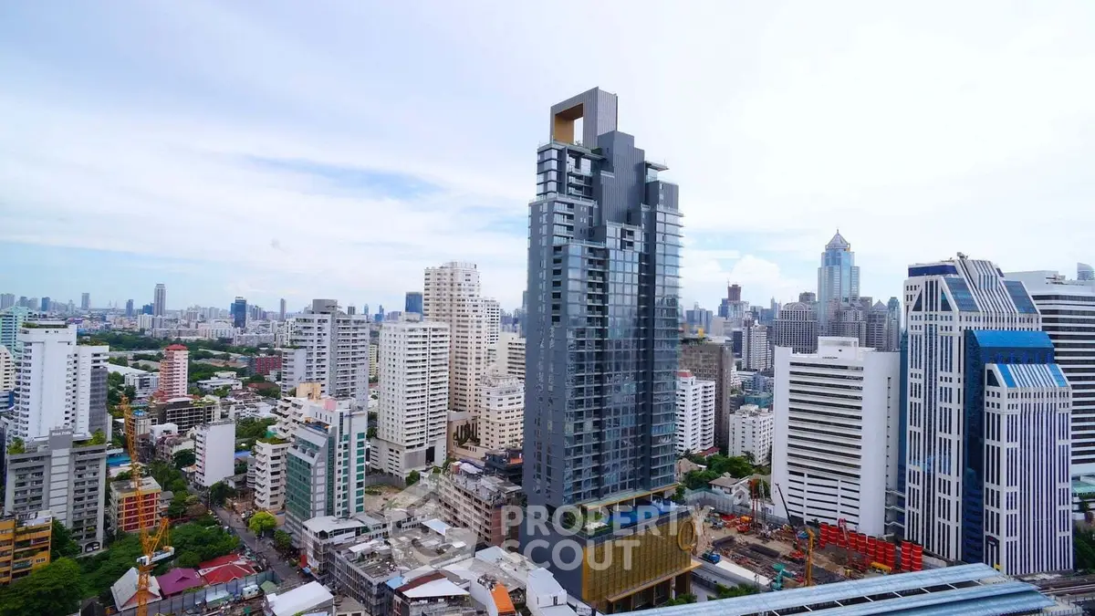 Stunning high-rise building with panoramic city views in a vibrant urban setting.