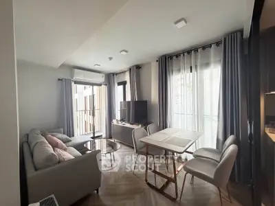 Modern living room with stylish furniture and natural light