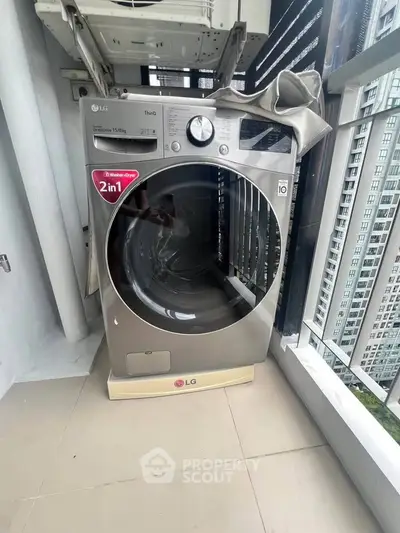 Modern LG washing machine on a high-rise balcony with city view, perfect for urban living convenience.