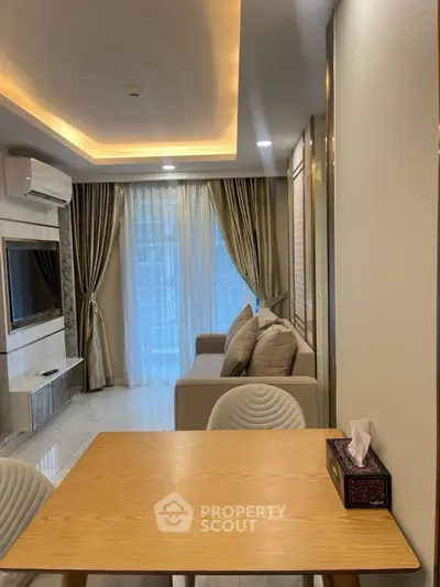 Modern living room with elegant decor and natural light