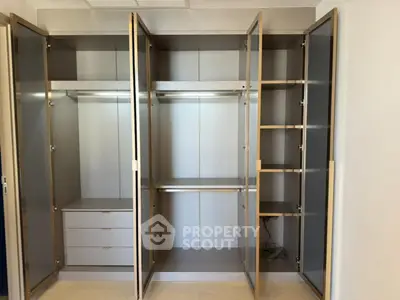 Spacious modern wardrobe with ample storage and sleek design