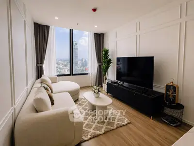 Luxurious living room with panoramic city view, modern furniture, and elegant decor.