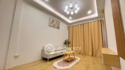 Modern living room with elegant lighting and cozy decor